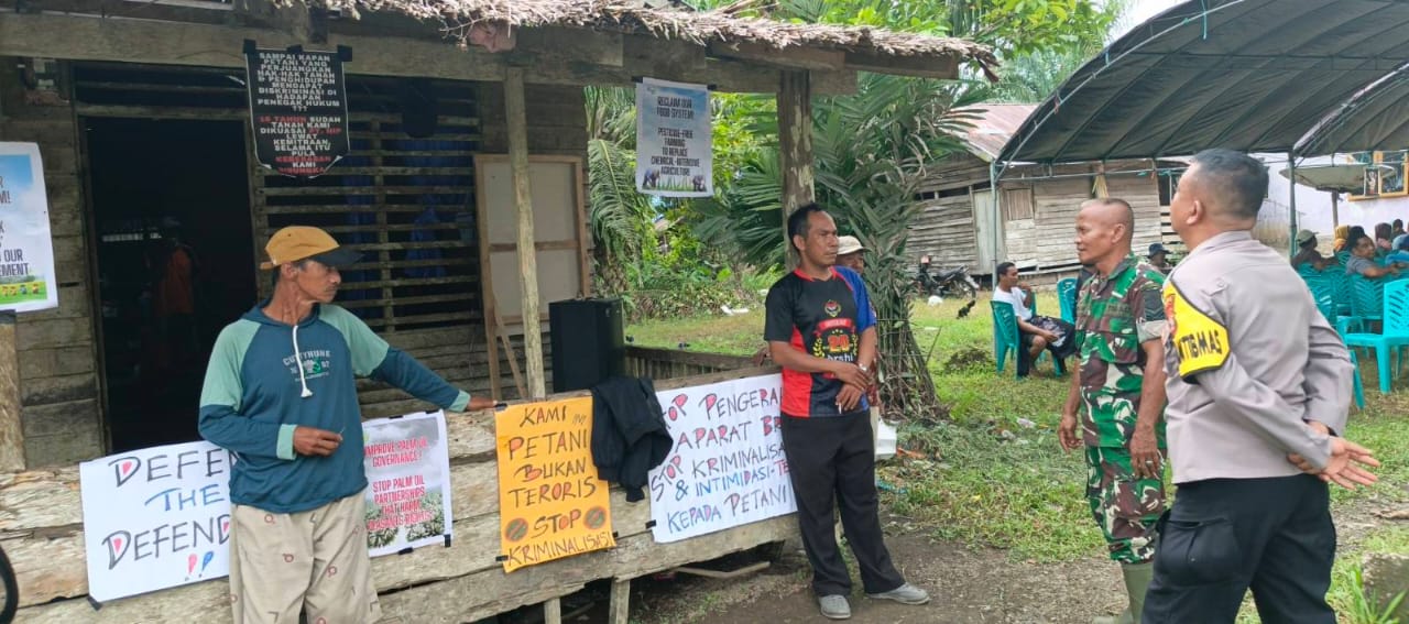 Kegiatan Peringatan Hari Hak Asasi Manusia (HAM) Internasional 2025 di Desa Wiangun, Kabupaten Buol, Sulawesi Tengah yang didatangi aparat. (Foto: Jaga Deca)