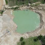 Aktivitas tambang emas ilegal di Pohuwato, Gorontalo yang meninggalkan lubang besar. Foto: Sarjan Lahay