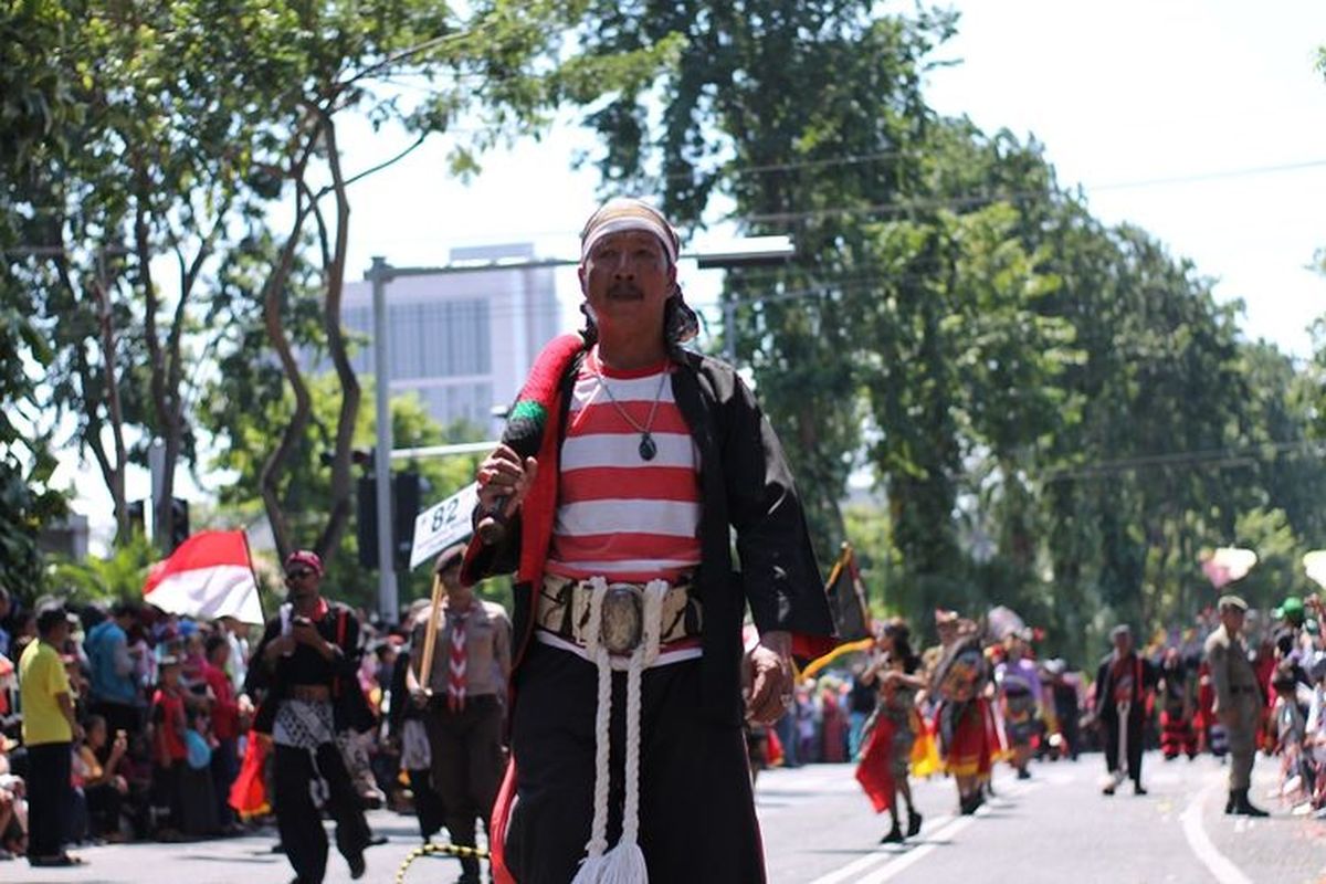 Ilustrasi orang Suku Madura dalam sebuah parade budaya.(Shutterstock/Joko Utomo)